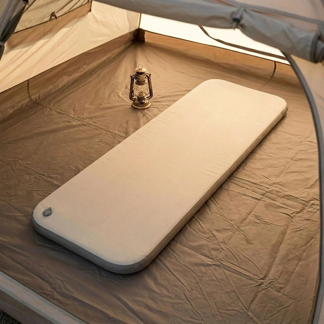 Unisex portable camping air mattress for comfortable outdoor sleep, inflatable bed for camp furniture.