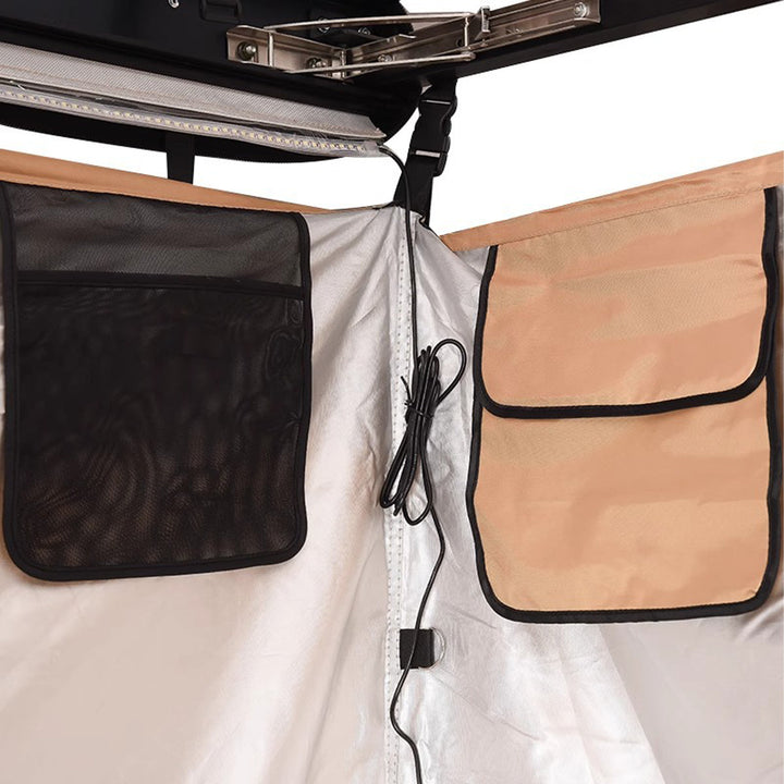 Lightweight car-mounted privacy tent, essential travel gear for outdoor adventurers and campers.