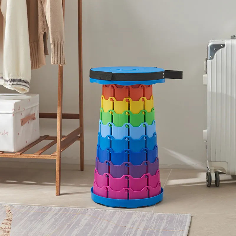 Unisex portable camping stool, shown in use providing comfortable outdoor seating