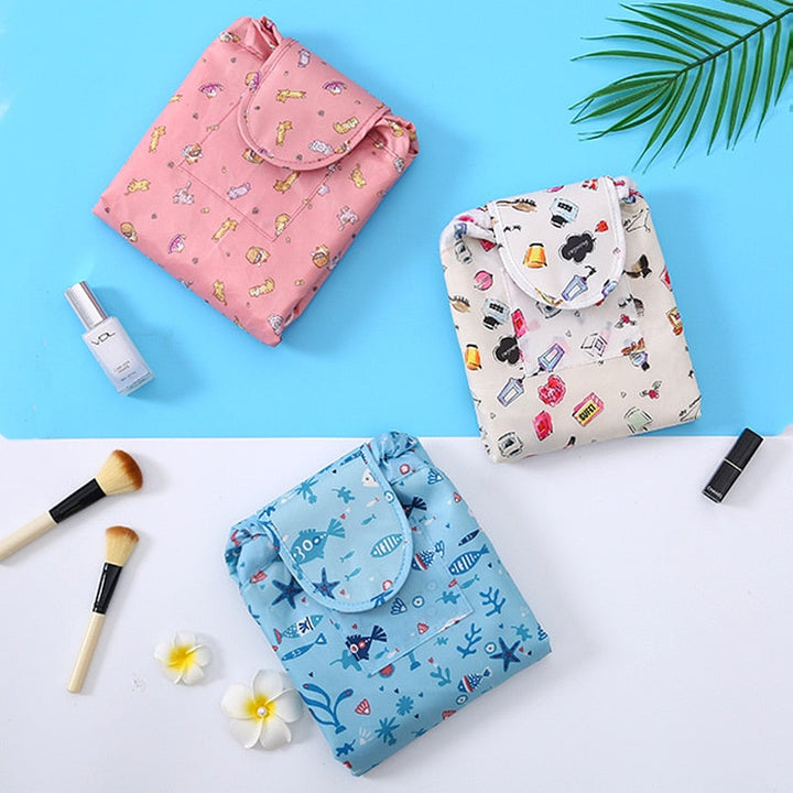 Waterproof drawstring makeup bag, portable travel organizer for beauty products & essentials.