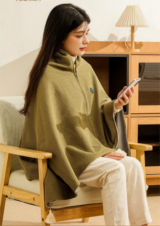 USB powered portable electric heated shawl blanket, soft fleece for travel, home, or office comfort in winter.
