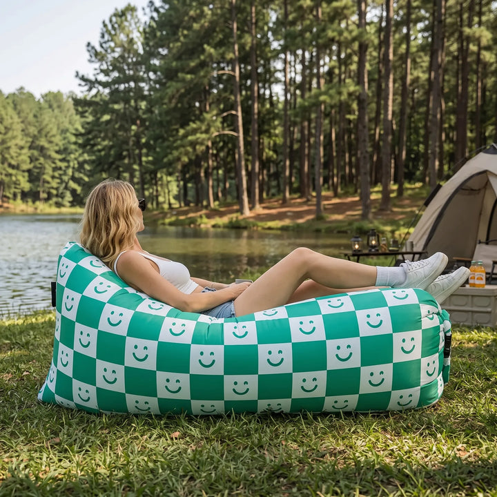 Unisex portable inflatable air lounger sofa for easy outdoor seating. Pump-free design, ideal for travel & camping.