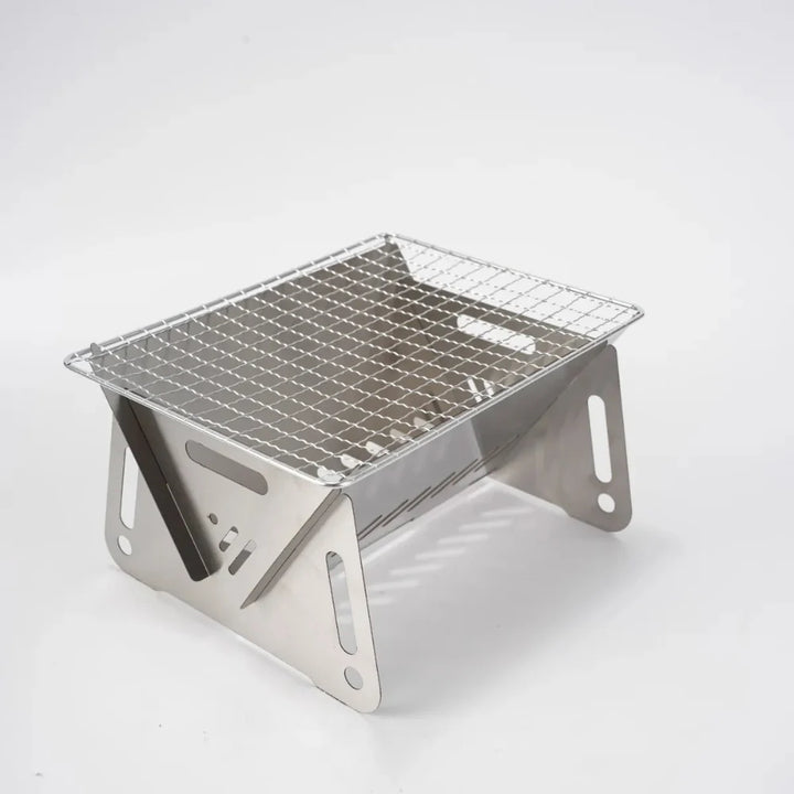 Unisex stainless steel backpacking grill, lightweight and easy to assemble for outdoor cooking.