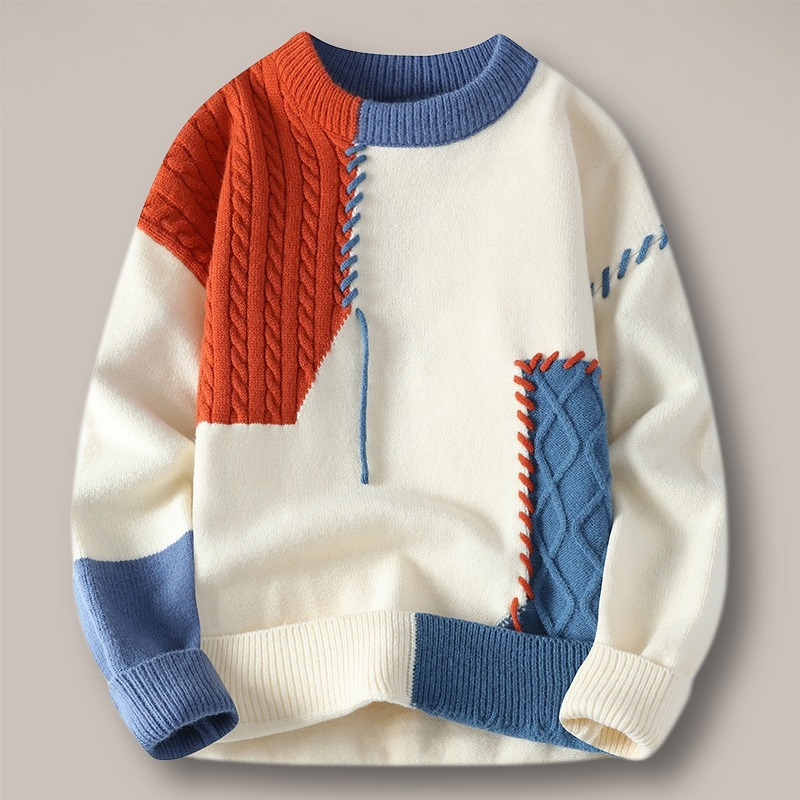 Textured knit unisex sweater featuring vibrant color block patterns and a comfortable crewneck.
