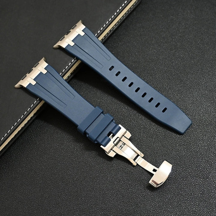 White hypoallergenic silicone smartwatch strap with secure titanium clasp.