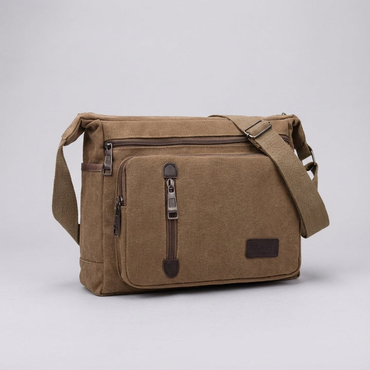 Spacious unisex retro canvas shoulder bag, suitable for travel and daily essentials. Durable & comfortable crossbody.