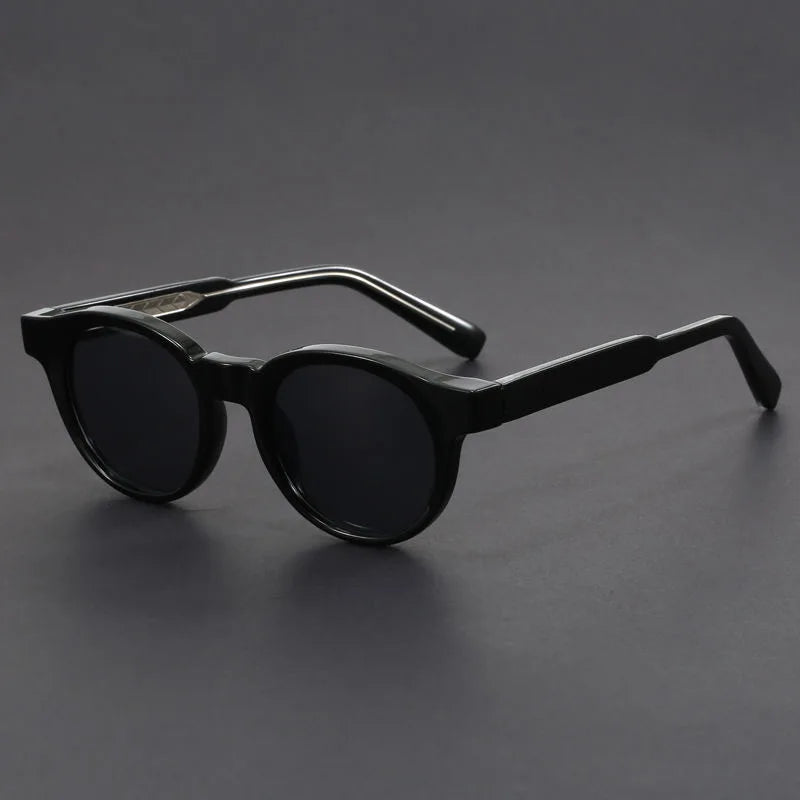 Vintage-inspired retro round sunglasses. Unisex UV protection eyewear for a stylish summer accessory.