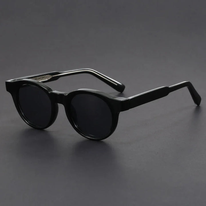 Vintage-inspired retro round sunglasses. Unisex UV protection eyewear for a stylish summer accessory.
