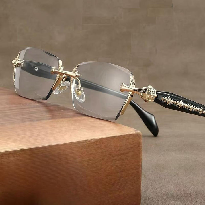 Elegant gold rimless eyeglasses for men & women. Lightweight design featuring a sleek metal frame & comfortable fit.