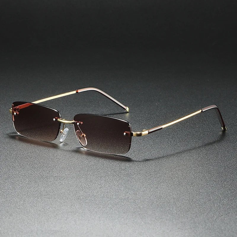 Lightweight unisex rimless rectangular sunglasses with gradient tint. Modern design, UV protective & outdoor ready.