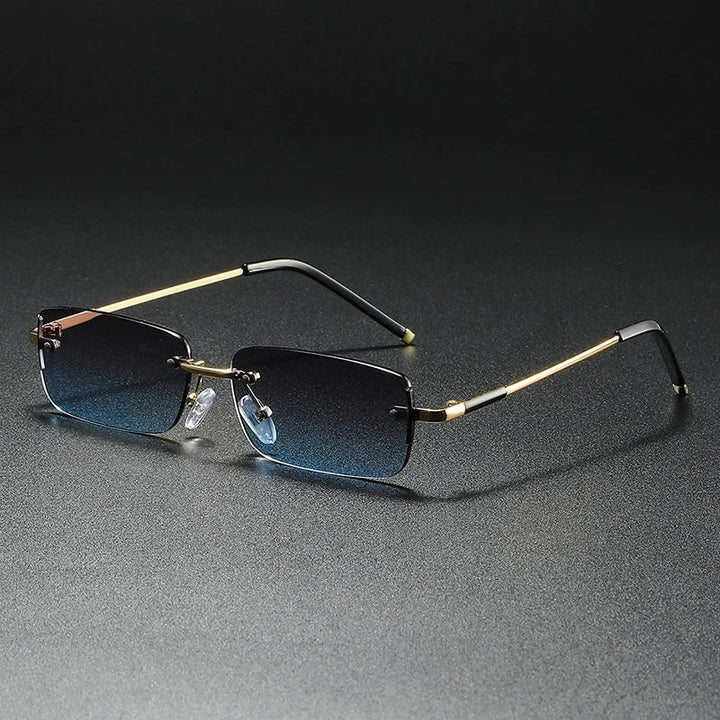 Fashionable rimless rectangular sunglasses with gradient tinted lenses & a sleek gold finish. Perfect for outdoor.