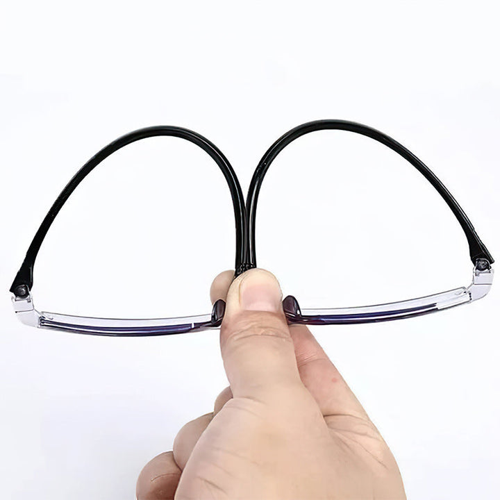 Unisex wearing SapphireView multifocal reading glasses, blue light filter, for comfortable reading & computer use.