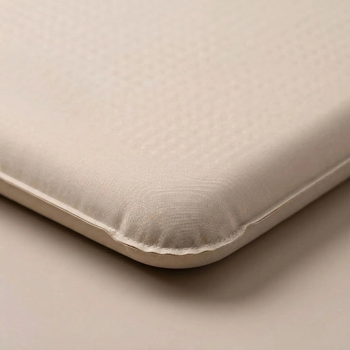 Unisex self-inflating sleeping pad in a tent, providing comfortable insulation for outdoor and car camping.