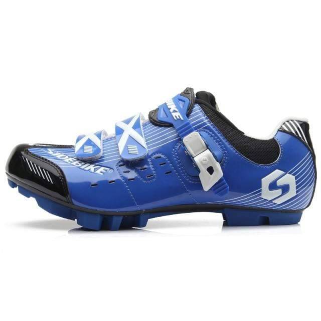 Side view of grey unisex athletic cycling shoes with stiff sole, ideal for efficient road biking performance.