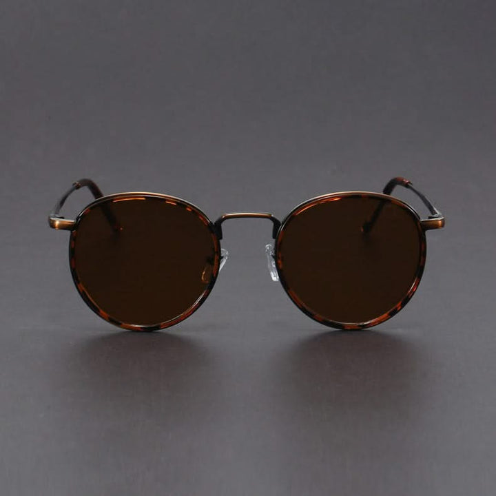 Modern unisex aviator sunglasses, sleek metal design, premium UV protection.