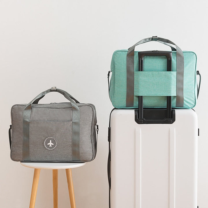Sleek unisex smart carry-on bag, ideal for modern travelers seeking organized, lightweight airport essentials.