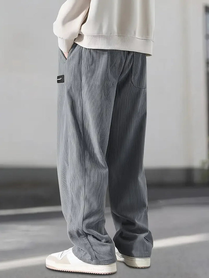 Comfortable wide leg corduroy pants, unisex design with soft fabric & vintage style.