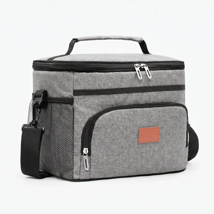 Insulated picnic bag, a portable and soft-sided food carrier for outdoor activities and daily meal prep.