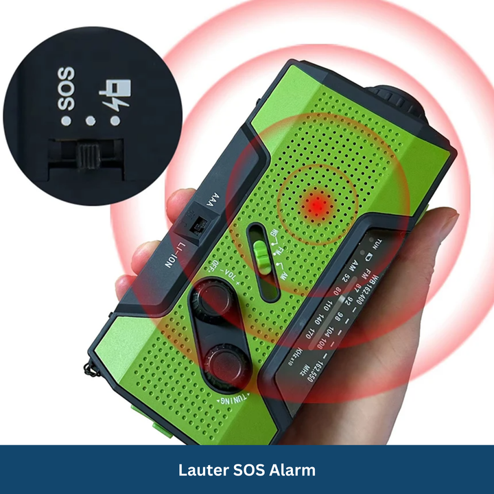 Handheld emergency radio with solar panel, crank charger, and USB port for charging devices outdoors