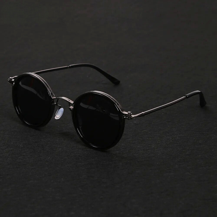 Gun metal Solis polarized sunglasses. Sleek unisex eyewear with anti-glare lenses & metal frame.