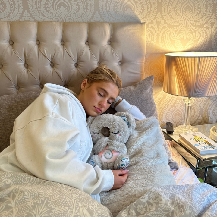 Ultra-soft rabbit plush comfort toy with gentle light, a calming companion designed for anxiety relief in adults & kids.