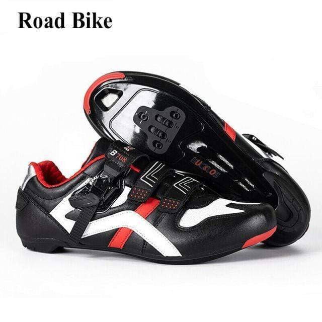 Close-up of SPD-SL road cycling shoe, white and red, showing cleat compatibility and ventilating mesh panels