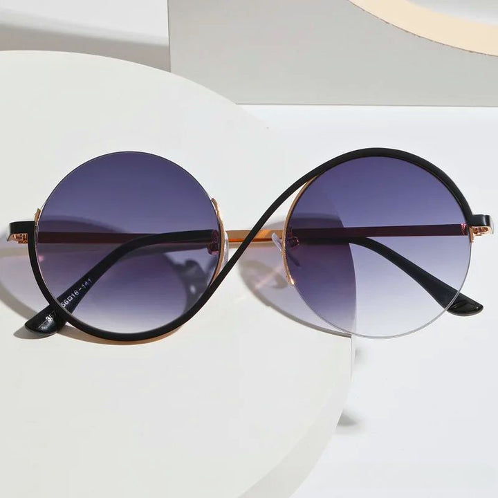 Sleek unisex curved sunglasses, a trendy fashion accessory providing essential UV protection.