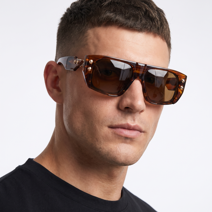 Unisex sunglasses, modern accessories providing superior UV protection and stylish fashion.