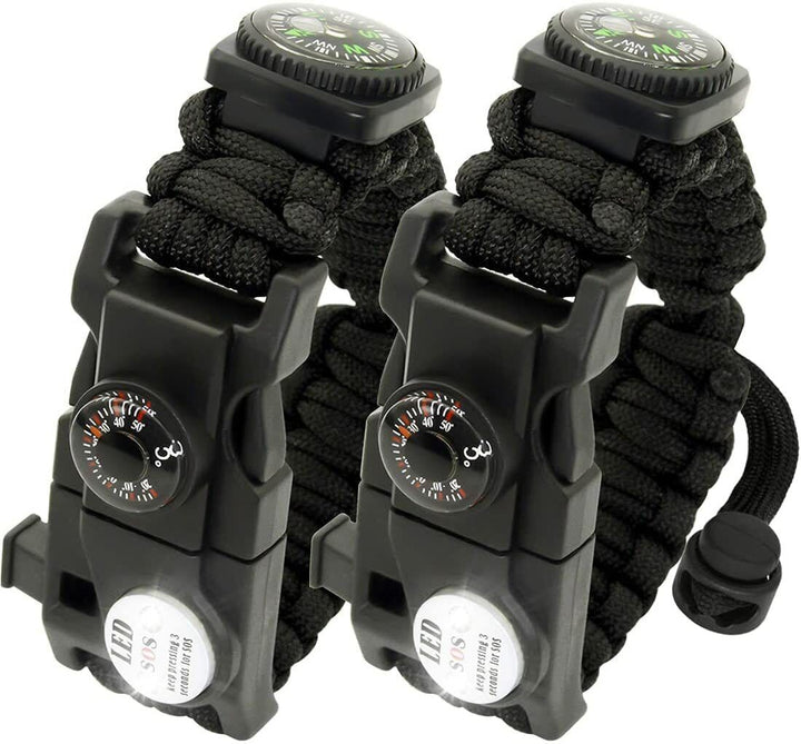 Black paracord survival bracelet showcasing its array of integrated emergency and outdoor tools