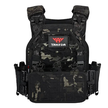 Man wearing a black tactical combat vest, adjustable plate carrier in action