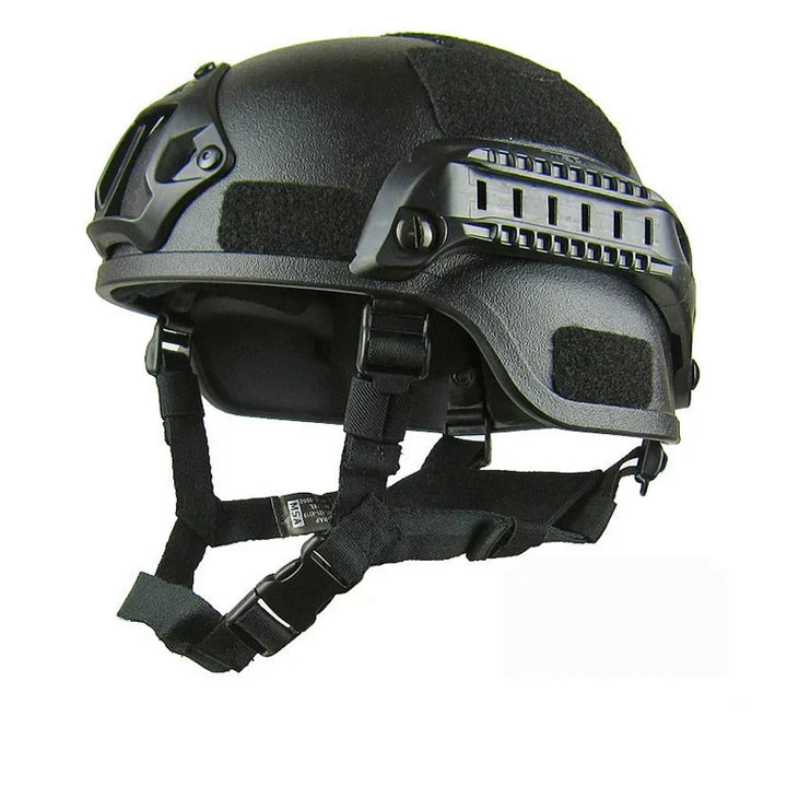 Black tactical FAST helmet for airsoft and paintball, offering superior head protection.
