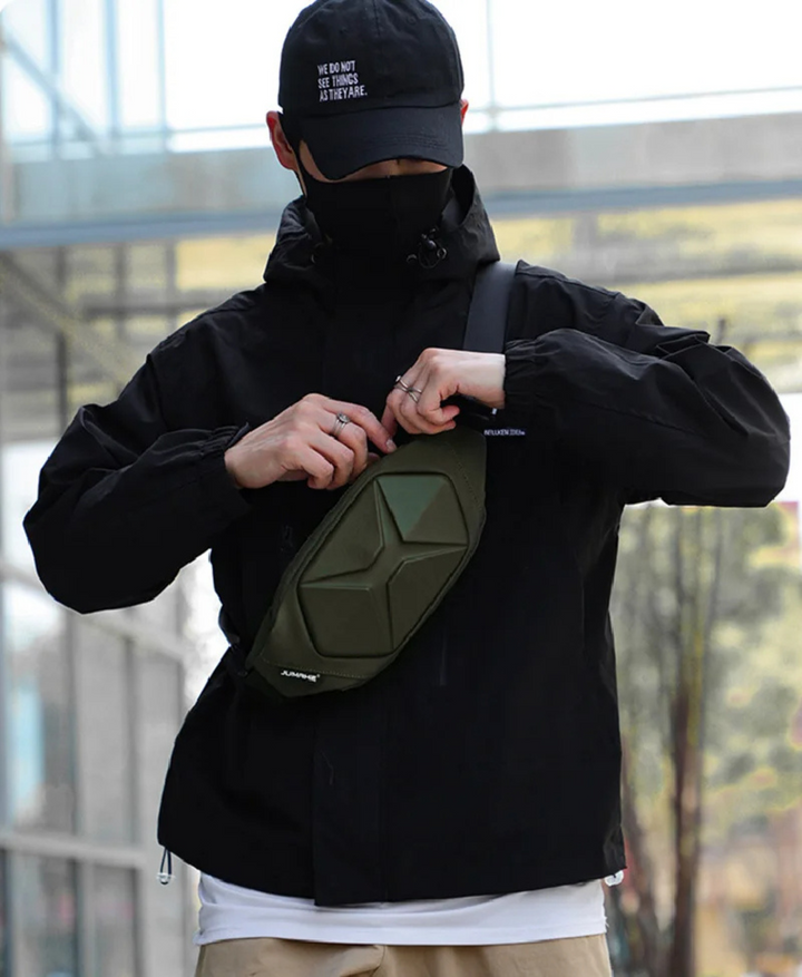 Water-resistant hard shell sling bag, a secure and versatile tactical option for men & women.