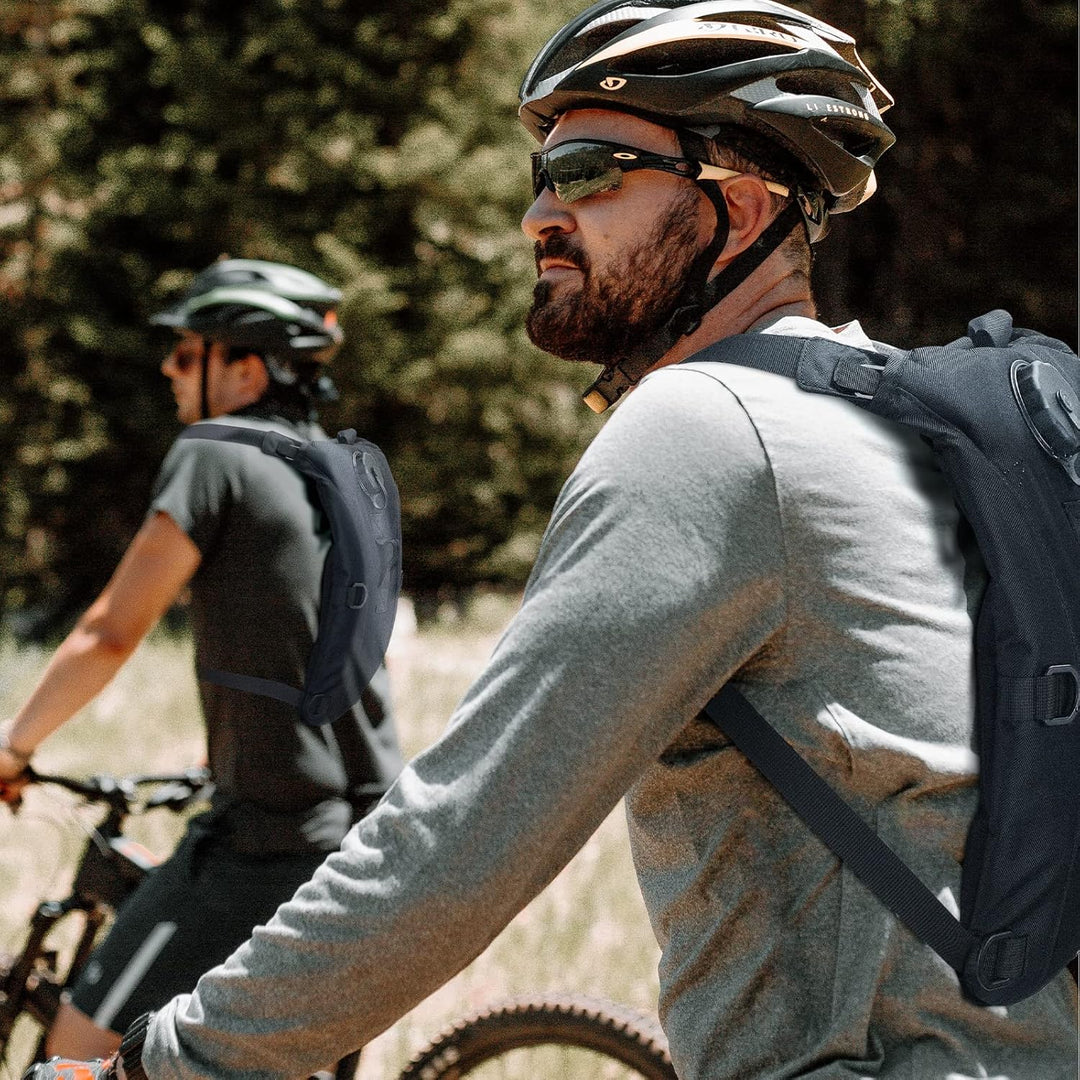Military-style hydration backpack featuring a 3-liter water bladder for outdoor gear