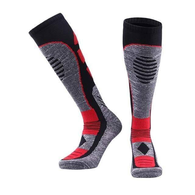Pair of black unisex thermal fleece winter socks, designed for warmth in cold weather, ideal for skiing and outdoor activities.