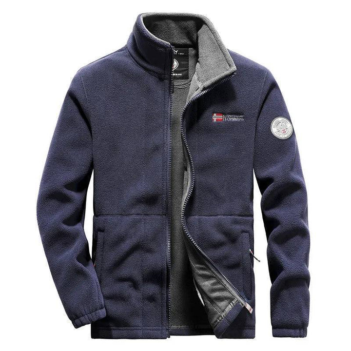 Unisex thermal fleece tactical jacket in a natural outdoor setting, durable windproof winter coat