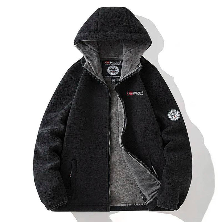 Breathable fabric detail of unisex thermal fleece tactical jacket, comfortable for outdoor sports