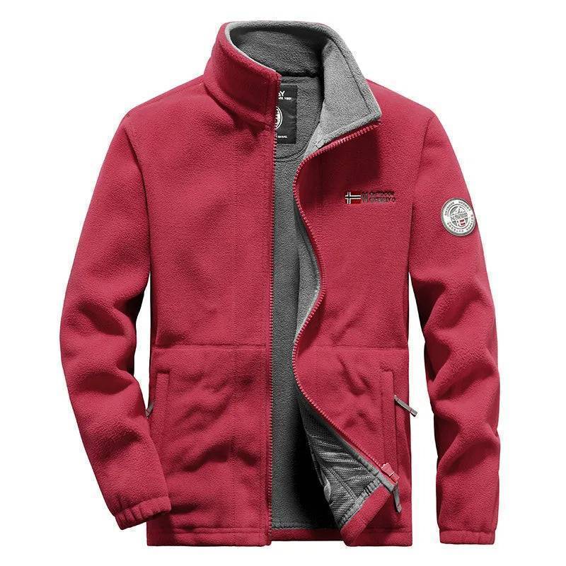 Group of adventurers wearing unisex thermal fleece tactical jackets, enjoying windproof outdoor sports