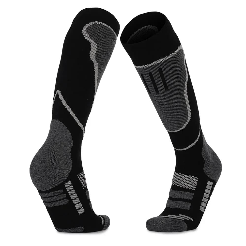 Unisex thermal ski socks, black with grey accents, designed for warmth and comfort on the slopes.