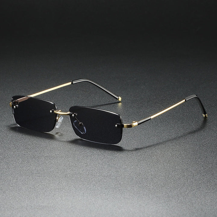 Luxury unisex ultra-light rimless rectangular sunglasses. Modern, fashionable sun protection accessory.