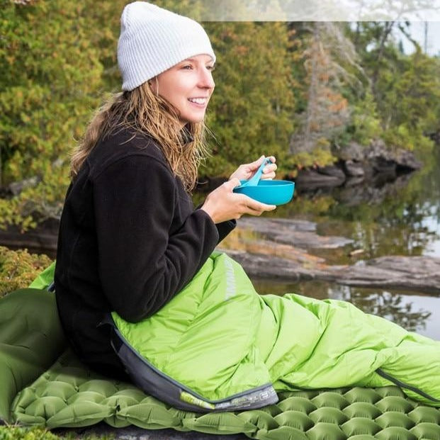 Durable fabric texture of an ultralight outdoor sleeping pad, signaling its high-quality construction.
