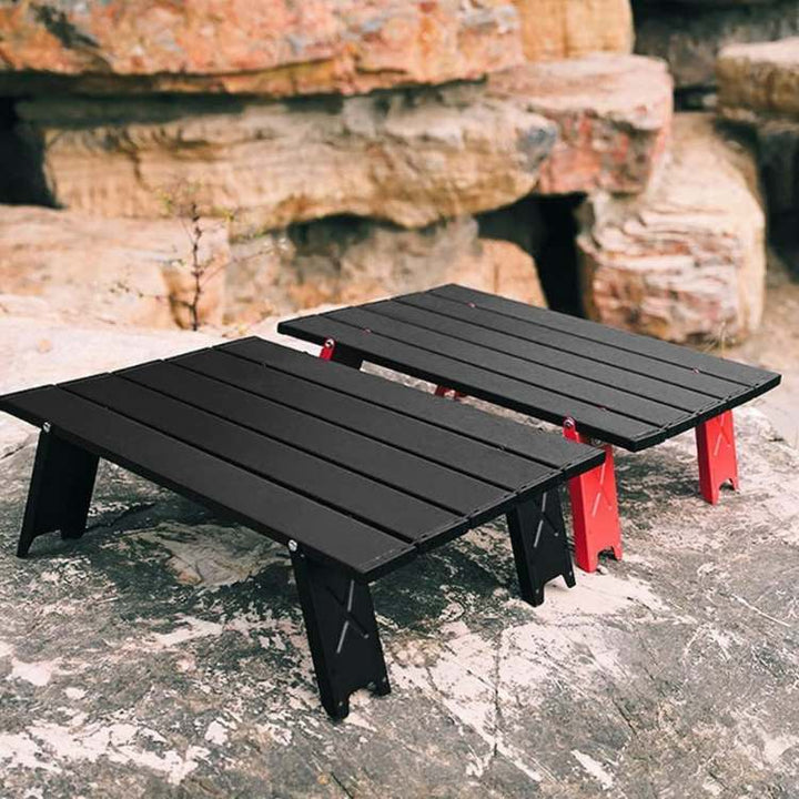 Compact aluminum foldable camping table, perfect for outdoor gear and travel adventures