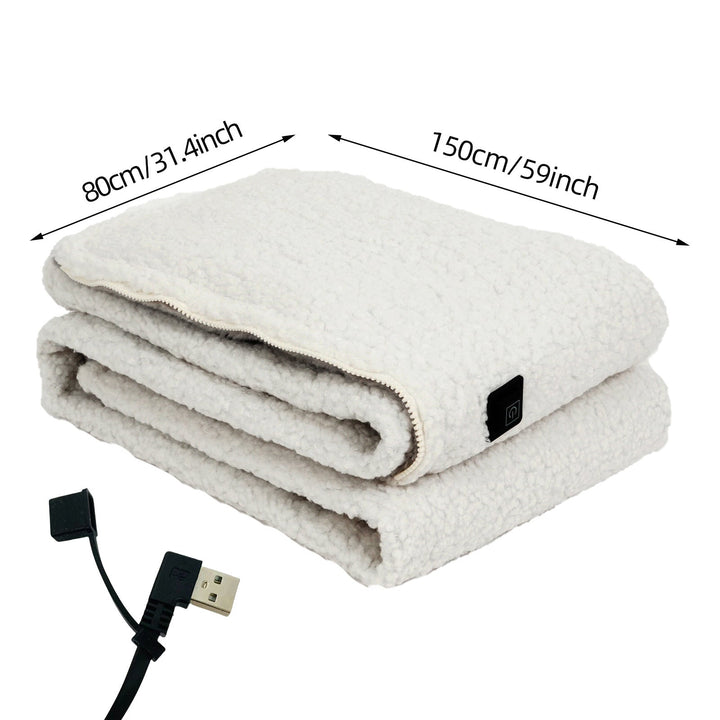 Comfortable USB heated throw blanket in a home setting, providing portable warmth for any activity.