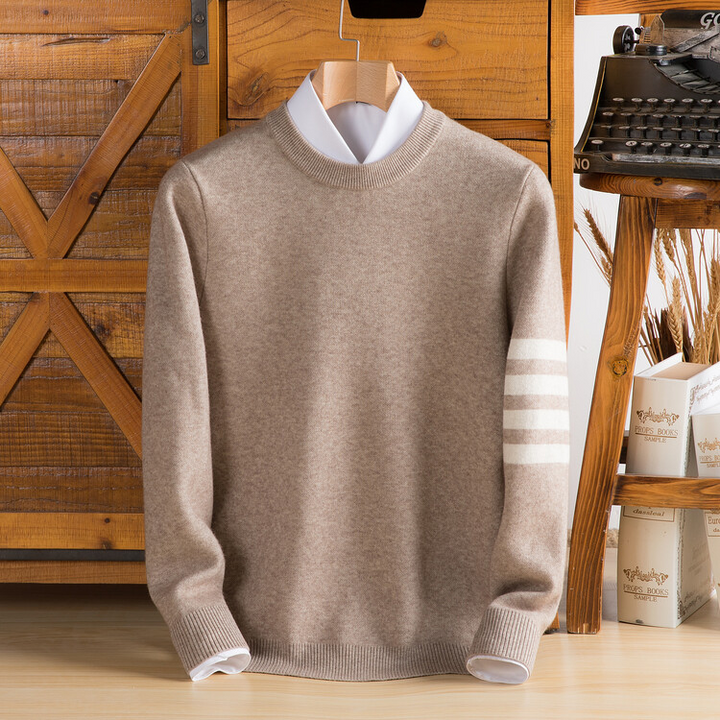 Classic varsity stripe unisex pullover sweater. A warm, cozy long-sleeve top providing stylish comfort for fall & winter.