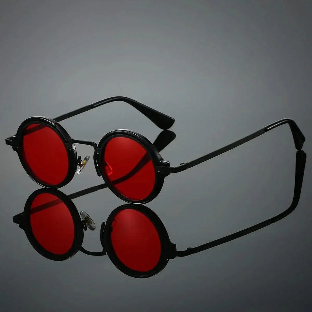 Vintage red frame round sunglasses, unisex, offering glare-resistant sun protection.