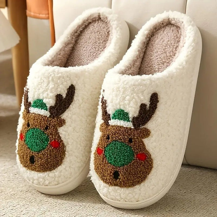 Unisex warm house slippers with a festive deer motif, perfect for winter comfort.