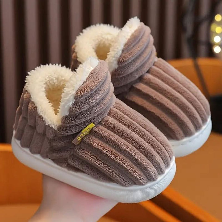 Unisex warm house slippers with non-slip sole, perfect for cold winter mornings.