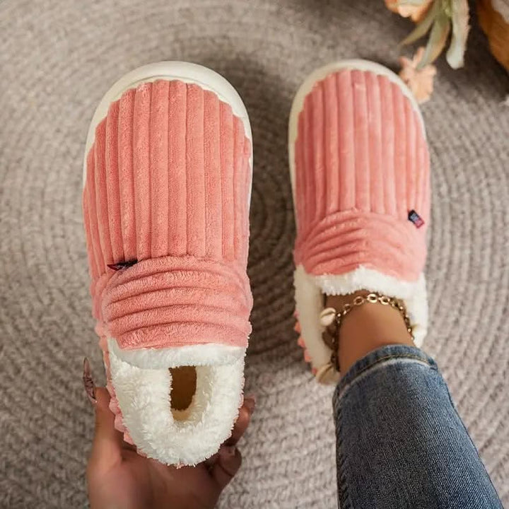 Unisex comfort slippers, thermal and plush, ideal for indoor winter activities.