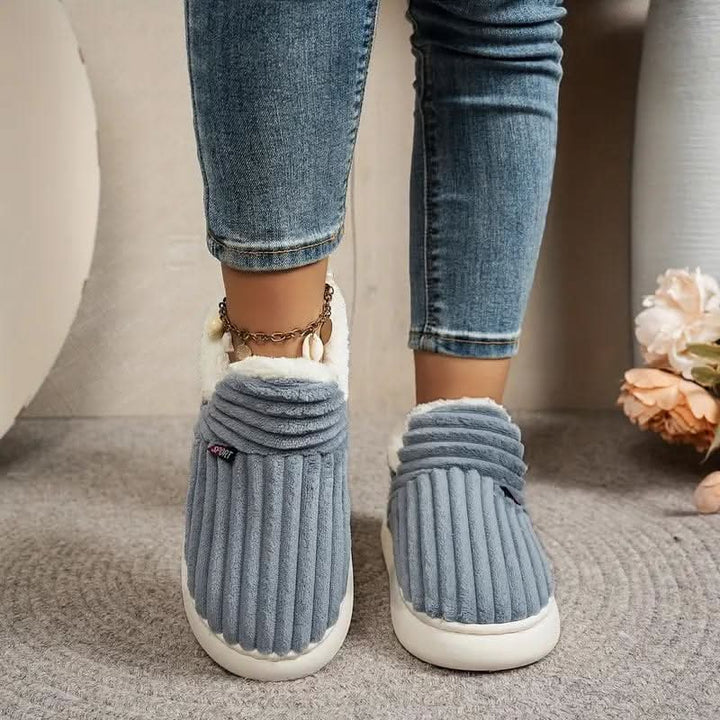 Gift-ready unisex house slippers, cozy plush and thermal for winter warmth.