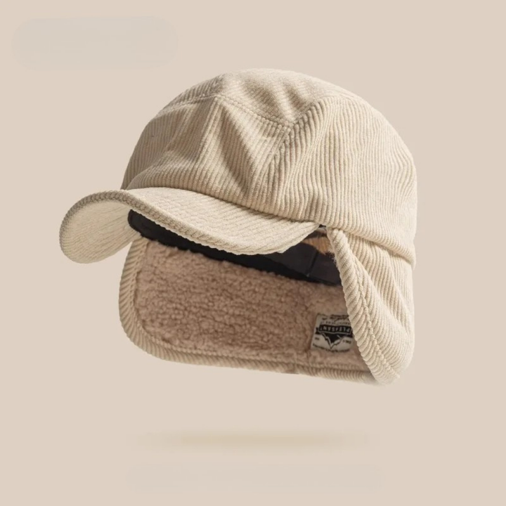 Rust colored unisex ear flap winter hat, perfect for outdoor activities & staying warm in cold weather.