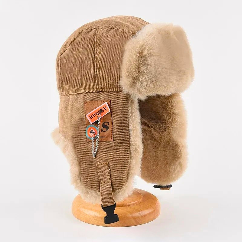 Cozy unisex trapper hat, a must-have winter outdoor gear, provides superior warmth with soft faux fur ear flaps.